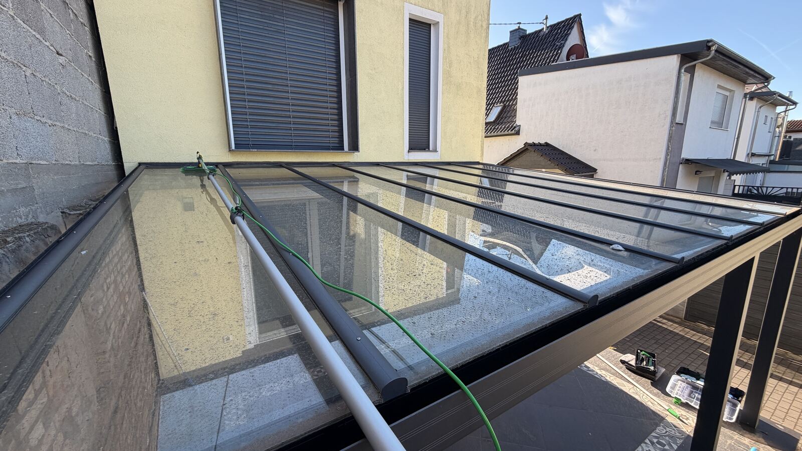 Terrassendach Glasreinigung